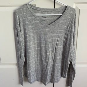 Gray and white striped long sleeve shirt